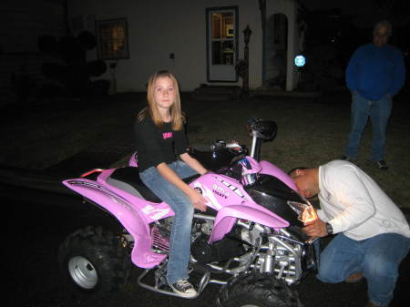 My angel, Amy on her new Quad....