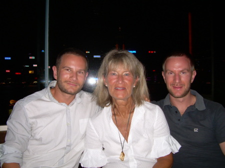 with sons in Hong Kong...
