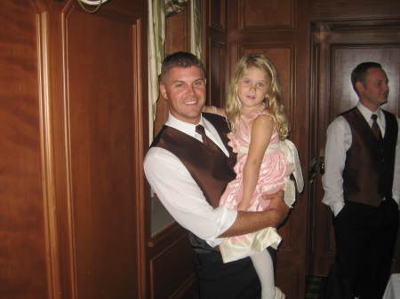 One of my heros, my brother Mark with my daughter, he returned from Iraq Dec 2006.  My brother Sean is on the right.