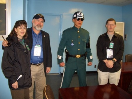 Will, Cathy, and Bryce at the DMZ with a ROC Marine