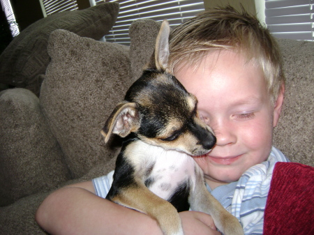 my son hugging MY christmas present