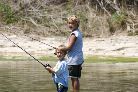 The boys fishing the San Gabriel River while camping