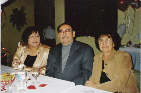 My parents and I at an anniversary party.