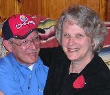 A fairly recent photo my wife and I on our couch in the parsonage