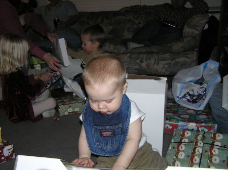 Cody opening his presents!!  Isn't he tha cutest??