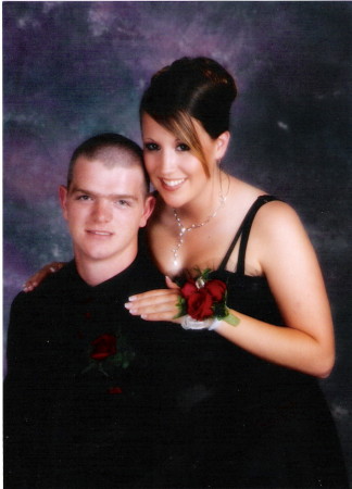 Michael and his girlfriend Amber. They are the happy grads of 2005