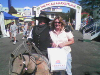 My wife Debbie having fun at the fair.  (2006)