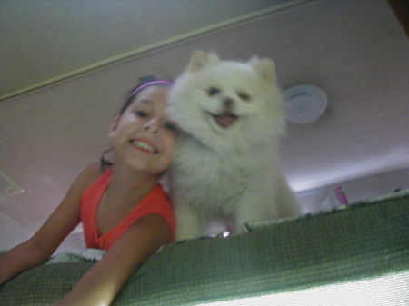 Hannah and Bean in loft of camper