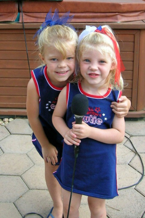 Our youngest 2 daughters singing karaoke