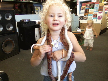 Ahlynn holding some snakes