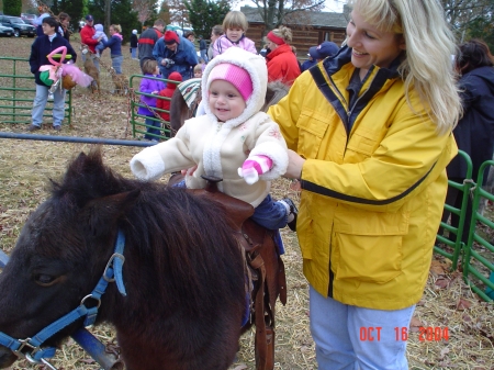 Kaitlin takes a pony ride.