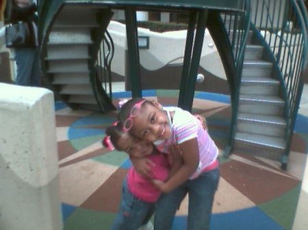 My godchild La'Shawn and her sister Alysia, (Alysia's 6 turning 7 on here and I call her my niece).