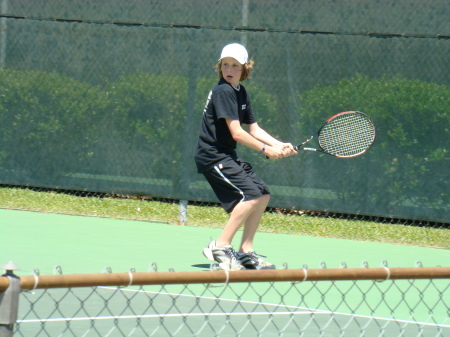Luke playing tennis