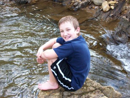 Cory in the creek.