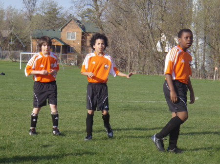 Tjero (Middle) playing soccer