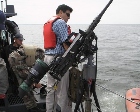 On a MKV Special Ops Combatant Craft waiting to board a smaller boat