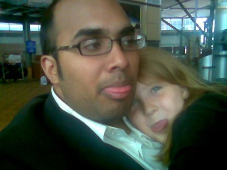 jordy being goofy with her daddy vik.