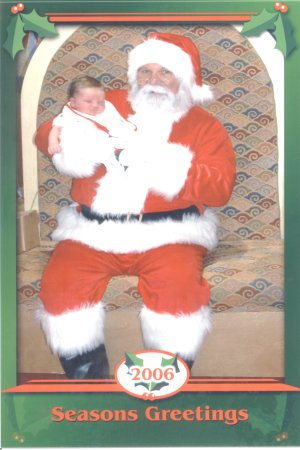 Santa and six day old baby boy.