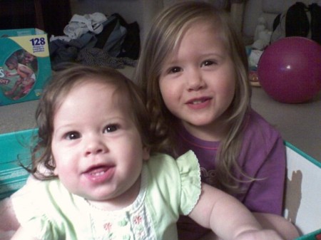 Isabella & Mara chillin' in a diaper box.