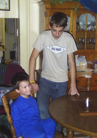 My sweet boys- Justin & Parker at their 14th & 4th birthday party. 10 yrs apart, yet so closely bonded!