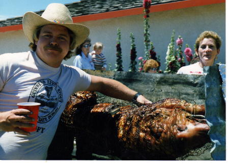 Farmer Augy Roasting a 90 lb. Pig