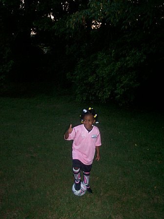 my daughter in her soccer uniform