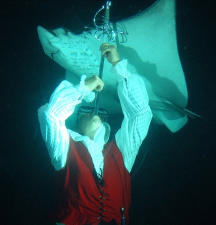 Dan Meyer swallowing a sword underwater
