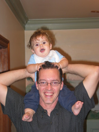 Levi on top of his Dad