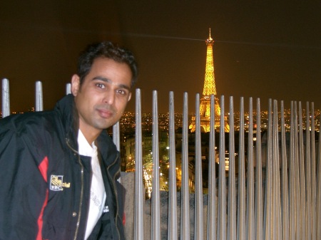 On top of the Arc de Triomphe, Eiffel in the background