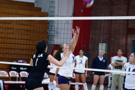 Our daughter playing college volleyball