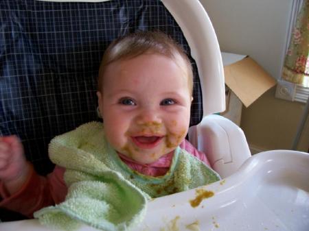 first time eating baby food. (green beans)