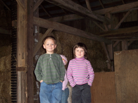 My kids in the hay barn.
