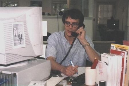 At work as a newspaper reporter, 2001