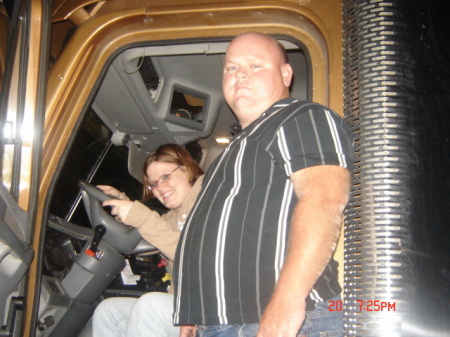 this is maria and her dad in his big truck