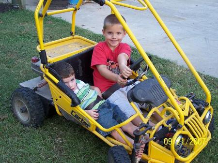 My son driving his cousin around