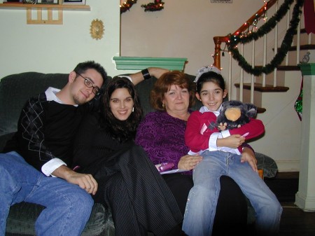 My brother Ricky, mom, Cassi and I Christmas 2005