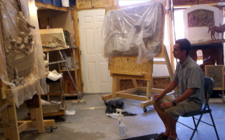 Leroy sculpting in his studio