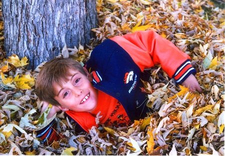 Chris - swimming in the leaves (10 yrs)