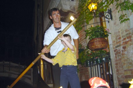  gondlier had a son Michaels' age (8) so he let him row the gondola through the canals of Venice. August 2004