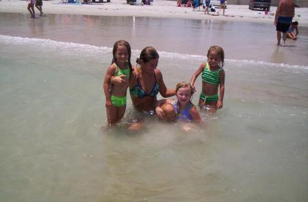 me and my 2 kids in the green my niece in the pink we are in florida