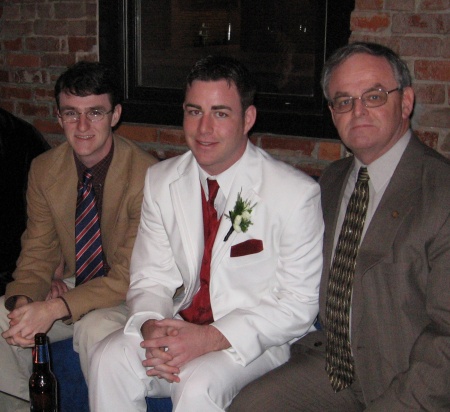 Father and sons Kyle in white tux and Collin