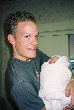 #1 son Travis, 26, with his newborn Trevor, 2004