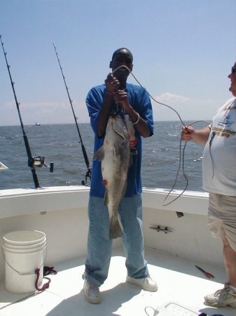 My son Jared with 40 pound drum fish