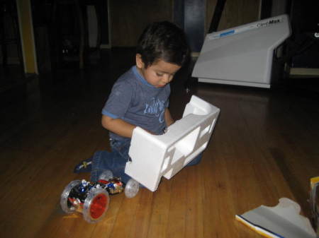 my son, Diego, opening gifts xmas 2007