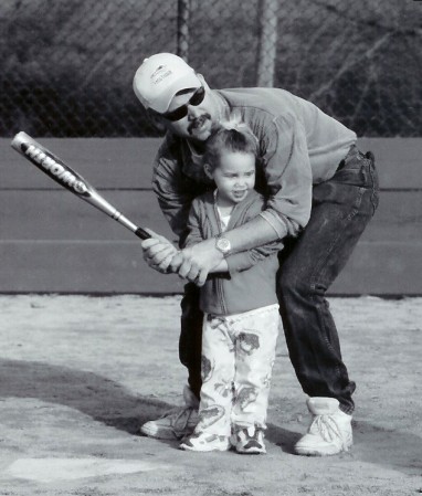 Teaching Lauren to play baseball