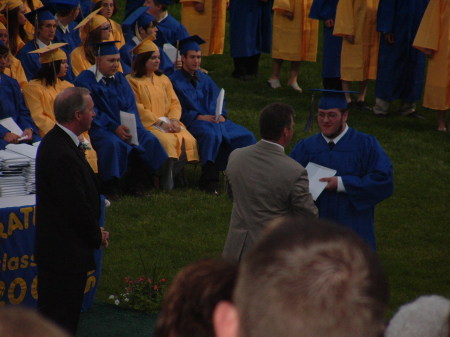 My son Carl getting his diploma June 2008