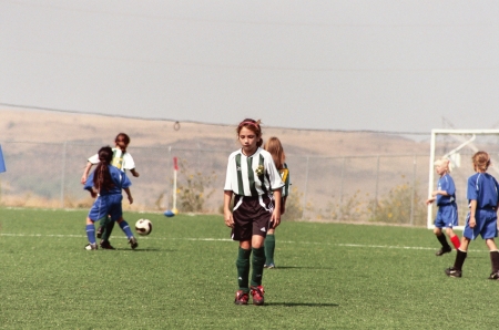 Megan playing soccer