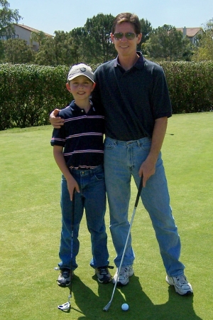 My son Ryan and I at the golf course, 4/2008