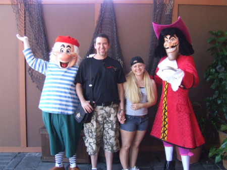 Chris and Jutea with Cptn. Hook and Smead WDW 5/06