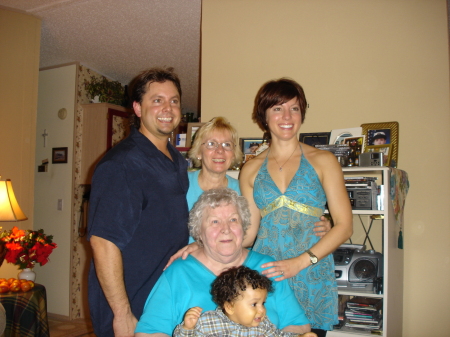 Xmas 2005: Jason(bro), Mom, Grandma, Falcon(nephew), and I